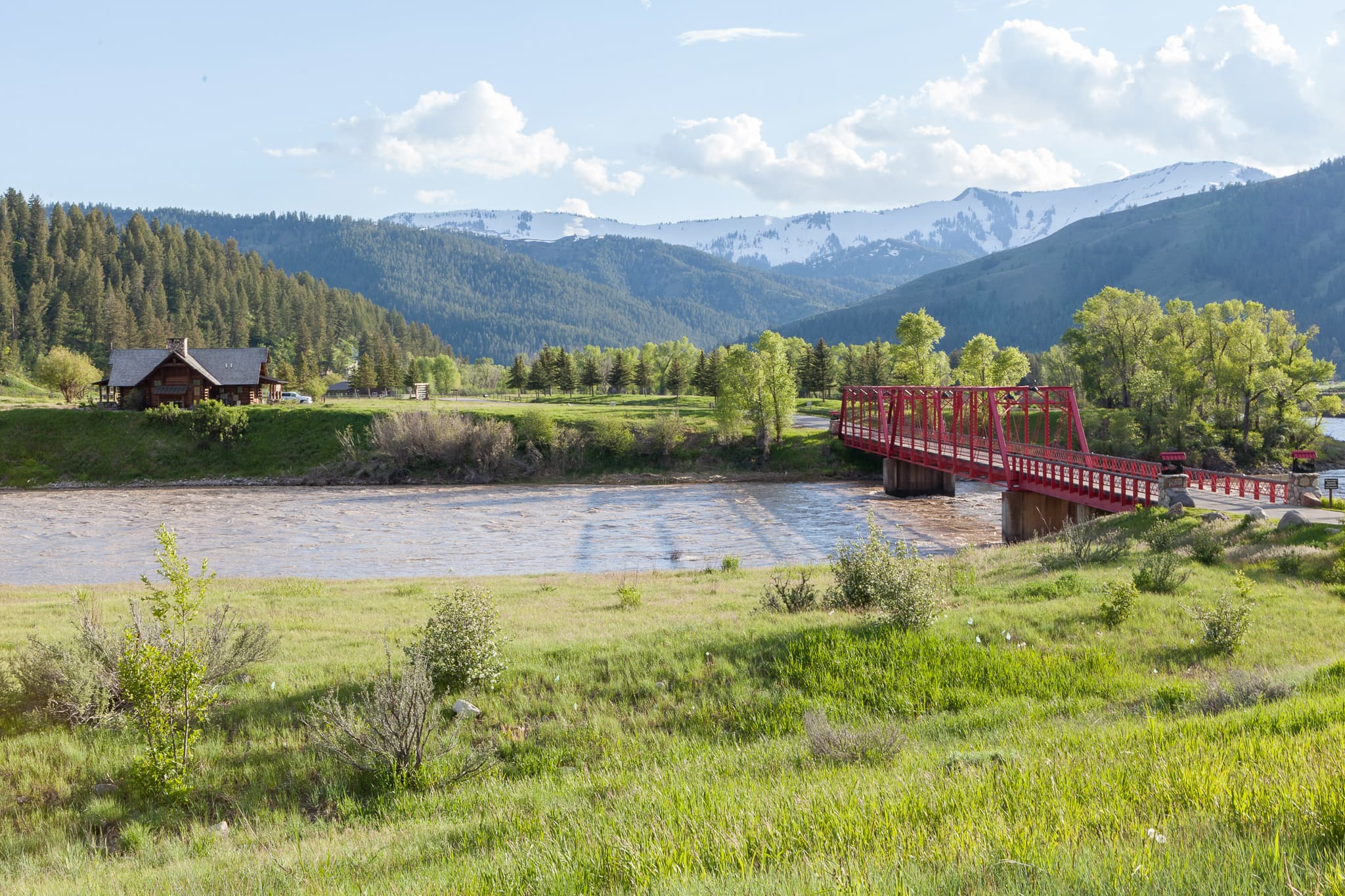 Red bridge across a river