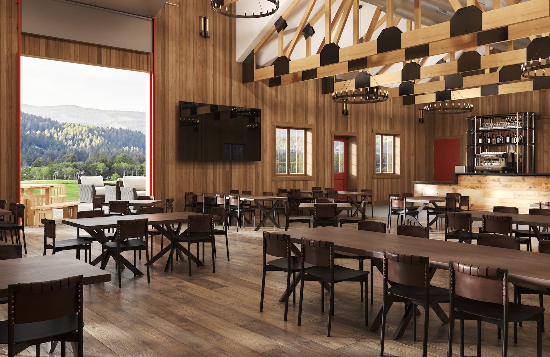 The Lodge Barn venue with the garage door up at Snake River Sporting Club in Jackson, Wy.