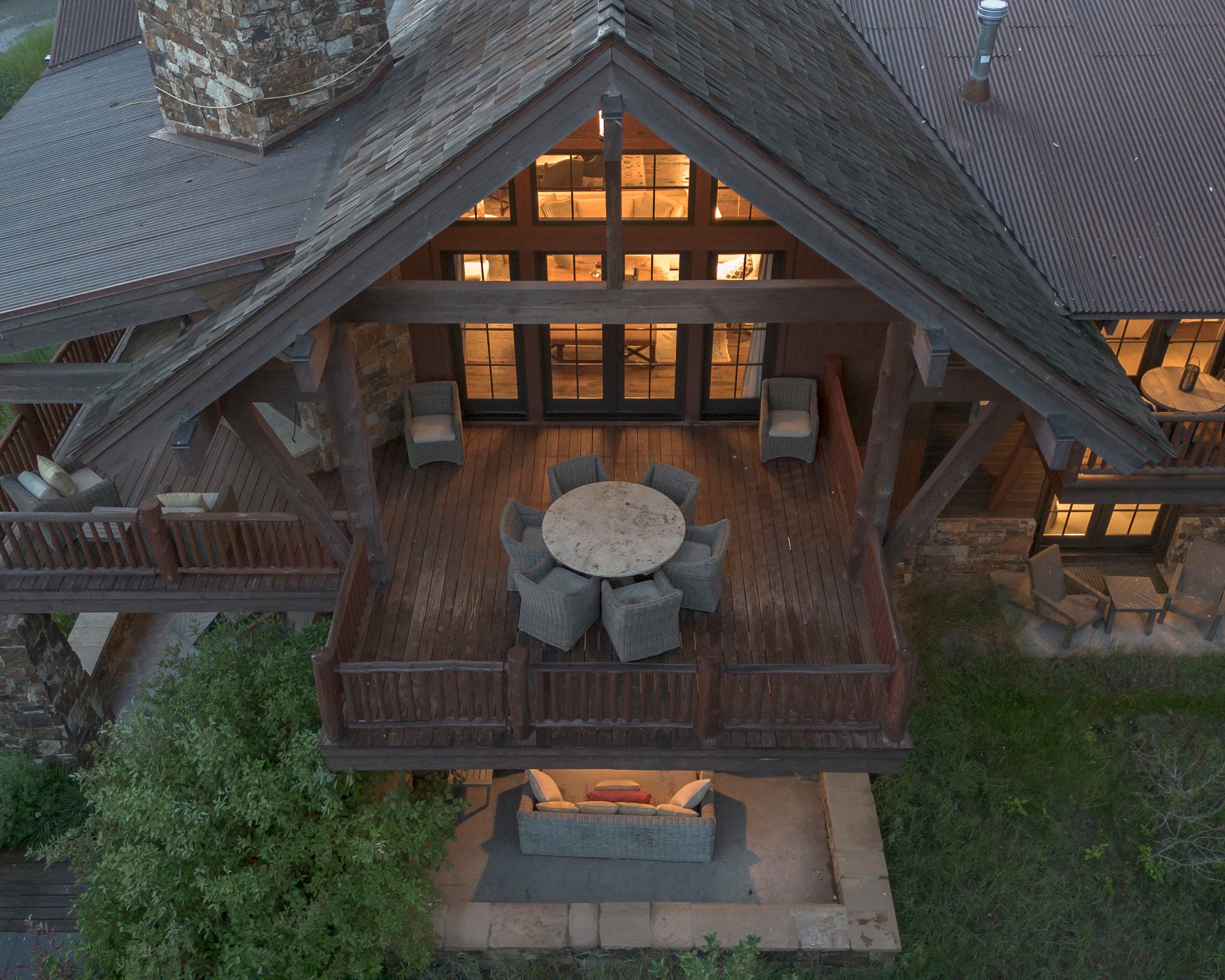 Aerial view of back patio of Martin Creek Cottage part of the Private Residence Collection at Snake River Sporting Club in WY.