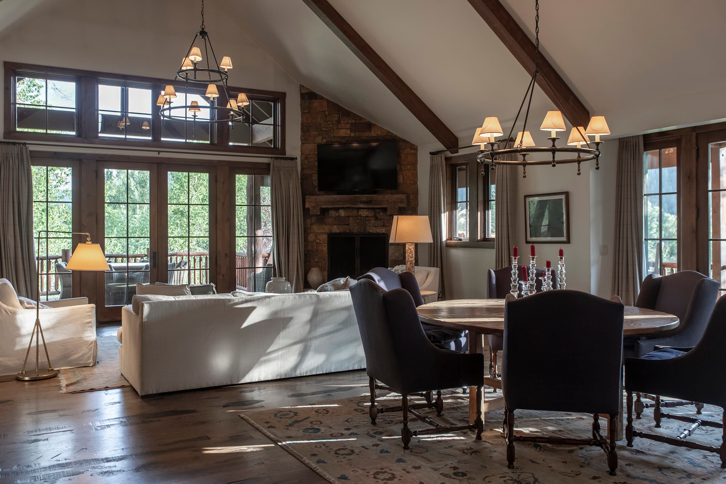 Interior open living and dining area of Martin Creek Cottage part of the Private Residence Collection at Snake River Sporting Club in WY.