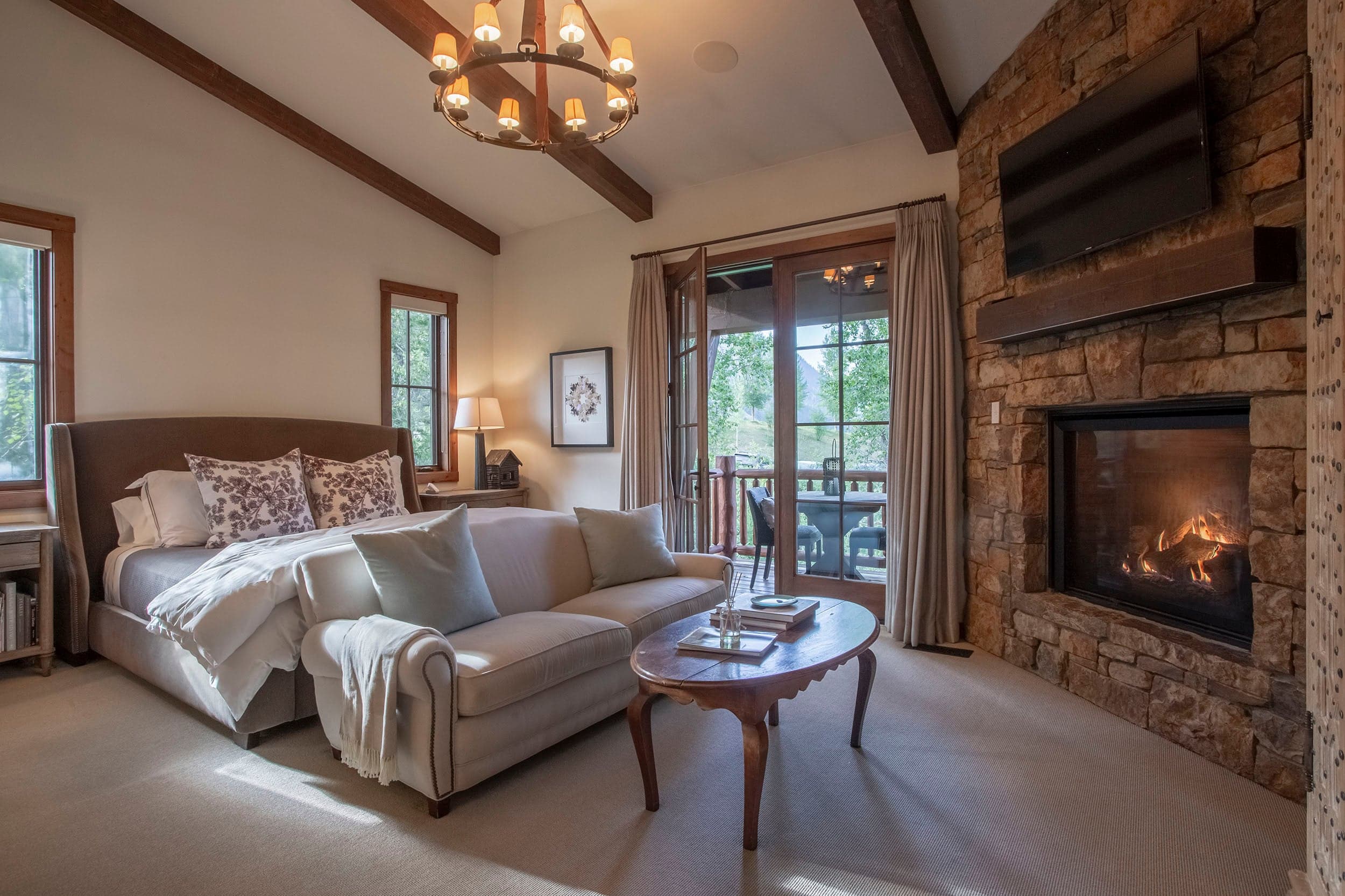 King Bedroom with fireplace in Martin Creek Cottage part of the Private Residence Collection at Snake River Sporting Club in WY.