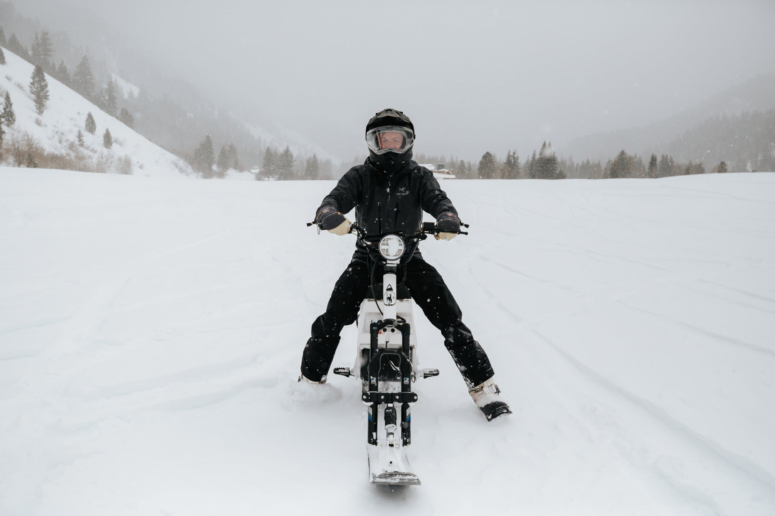 A person moonbiking through the snow in Jackson Hole, WY