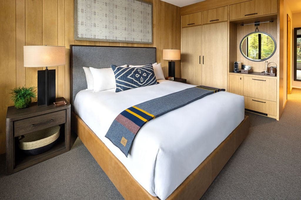 King Guest Room bed at the Sylvan Lodge